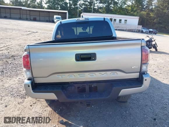 2023 Toyota Tacoma SR z VIN 3TMCZ5AN1PM619840, wystawiony jako IAAI lot #43224940 z przebiegiem 26 442 mil mil oraz . Historia ofert i sprzedaży dostępna na DreamBid. Obrazek 17.