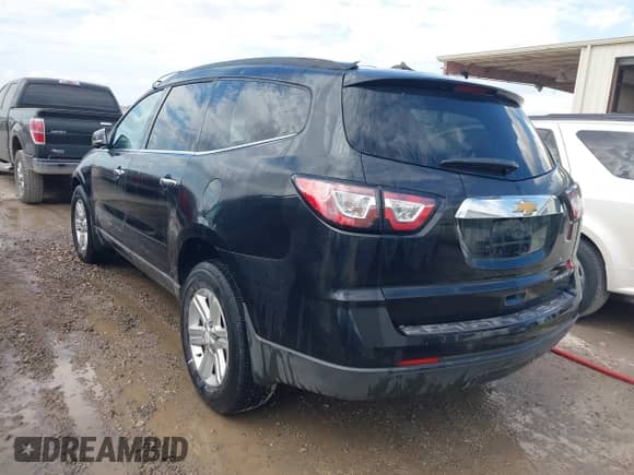 2013 Chevrolet Traverse LT z VIN 1GNKRGKD2DJ163439, wystawiony jako IAAI lot #43376681 z przebiegiem 117 429 mil mil oraz . Historia ofert i sprzedaży dostępna na DreamBid. Obrazek 3.