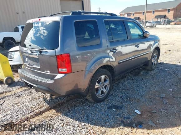 2014 Honda Pilot EX-L z VIN 5FNYF4H58EB016710, wystawiony jako IAAI lot #43349794 z przebiegiem 163 710 mil mil oraz . Historia ofert i sprzedaży dostępna na DreamBid. Obrazek 4.