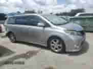 2012 Toyota Sienna SE with VIN 5TDXK3DC5CS259339, listed as a Copart auction lot 68835155 with 266,868 mi miles and Salvage title. Bid and sale history available at DreamBid. Image 4.
