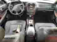 2002 Hyundai Sonata GLS z VIN KMHWF35H42A591337, wystawiony jako Copart lot #62079195 z przebiegiem 244 974 mil mil oraz Szkoda całkowita • Salvage title. Historia ofert i sprzedaży dostępna na DreamBid. Obrazek 8.