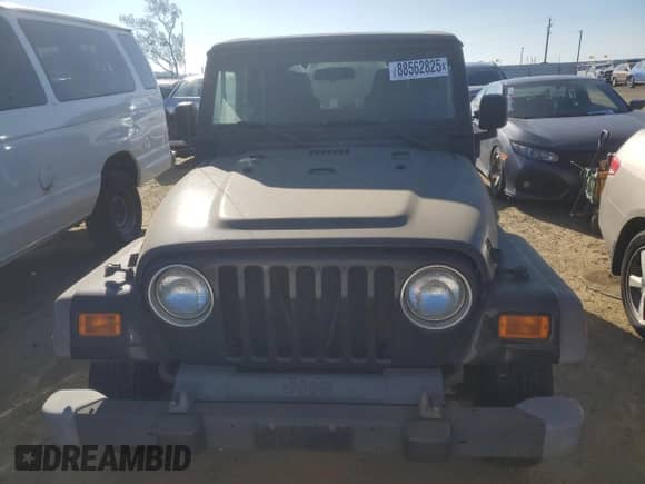 2005 Jeep Wrangler SE z VIN 1J4FA291X5P340277, wystawiony jako Copart lot #88562825 z przebiegiem 224 475 mil mil oraz Czysty tytuł • Clean title. Historia ofert i sprzedaży dostępna na DreamBid. Obrazek 5.