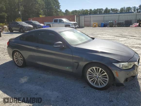 2014 BMW 4 Series 428i с VIN WBA3N3C57EF711008, выставлен на аукционе Copart как лот 85096145 с пробегом 196 057 миль миль и Чистый • Clean title. История ставок и продаж доступна на DreamBid. Изображение 4.