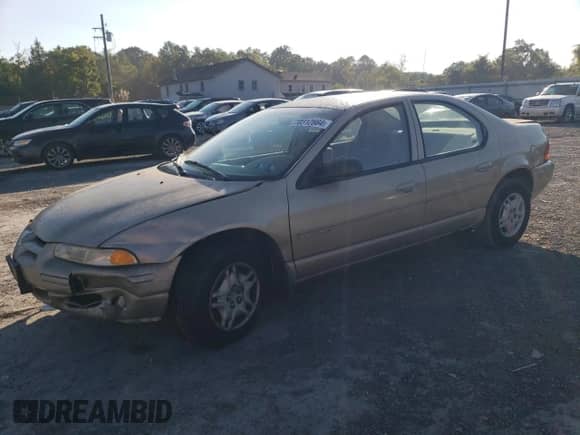 1999 Dodge Stratus with VIN 1B3EJ46X0XN684268, listed as a Copart auction lot 70312664 with 140,711 mi miles and Salvage title. Bid and sale history available at DreamBid. Image 1.