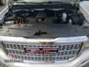 2018 GMC Sierra 1500 Denali z VIN 3GTP1PEC9JG510867, wystawiony jako Copart lot #65768565 z przebiegiem 50 540 mil mil oraz Szkoda całkowita • Salvage title. Historia ofert i sprzedaży dostępna na DreamBid. Obrazek 11.