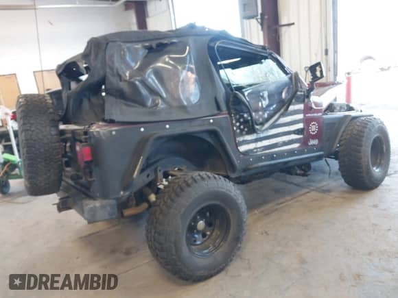 2001 Jeep Wrangler SE with VIN 1J4FA29P01P372136, listed as a IAAI auction lot 42013962 with 163,732 mi miles and . Bid and sale history available at DreamBid. Image 4.