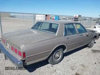 1984 Chevrolet Caprice с VIN 1G1AN69H9EH136601, выставлен на аукционе IAAI как лот 41664097 с пробегом 85 121 миль миль и . История ставок и продаж доступна на DreamBid. Изображение 4.