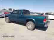 1999 Dodge Dakota SLT z VIN 1B7GG22Y0XS235487, wystawiony jako Copart lot #67135275 z przebiegiem 142 222 mil mil oraz Czysty tytuł • Clean title. Historia ofert i sprzedaży dostępna na DreamBid. Obrazek 2.