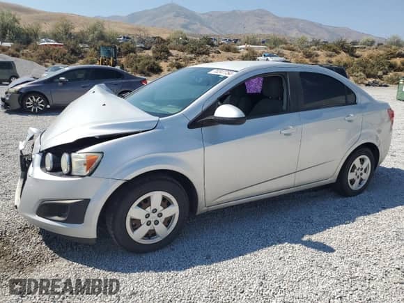 2015 Chevrolet Sonic LS with VIN 1G1JB5SH2F4126482, listed as a Copart auction lot 70247754 with 99,090 mi miles and Salvage title. Bid and sale history available at DreamBid. Image 1.