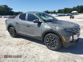 2022 Hyundai Santa Cruz SEL с VIN 5NTJBDAE6NH027490, выставлен на аукционе Copart как лот 76171364 с пробегом 37 207 миль миль и Списание • Salvage title. История ставок и продаж доступна на DreamBid. Изображение 4.