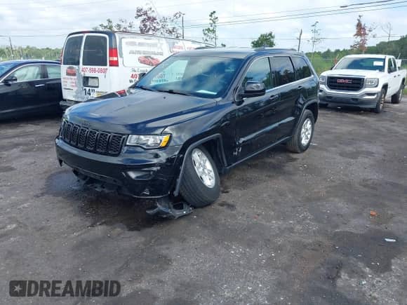 2020 Jeep Grand Cherokee Laredo E with VIN 1C4RJEAG7LC246477, listed as a IAAI auction lot 43113752 with 26,198 mi miles and . Bid and sale history available at DreamBid. Image 2.