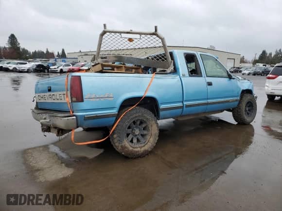 1995 Chevrolet Silverado 2500 с VIN 2GCFK29K9S1107351, выставлен на аукционе Copart как лот 49819485 с пробегом Не указан миль и Списание • Salvage title. История ставок и продаж доступна на DreamBid. Изображение 3.