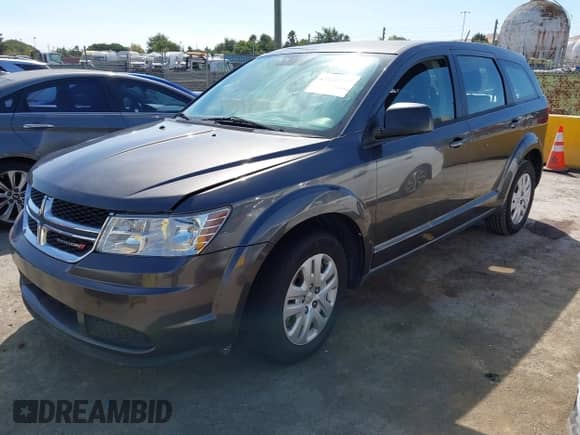 2014 Dodge Journey American Value with VIN 3C4PDCAB4ET194160, listed as a IAAI auction lot 43145793 with 194,266 mi miles and . Bid and sale history available at DreamBid. Image 2.