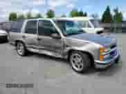 1999 Chevrolet Tahoe with VIN 1GNEC13R0XJ546712, listed as a Copart auction lot 62722745 with 108,864 mi miles and Salvage title. Bid and sale history available at DreamBid. Image 4.