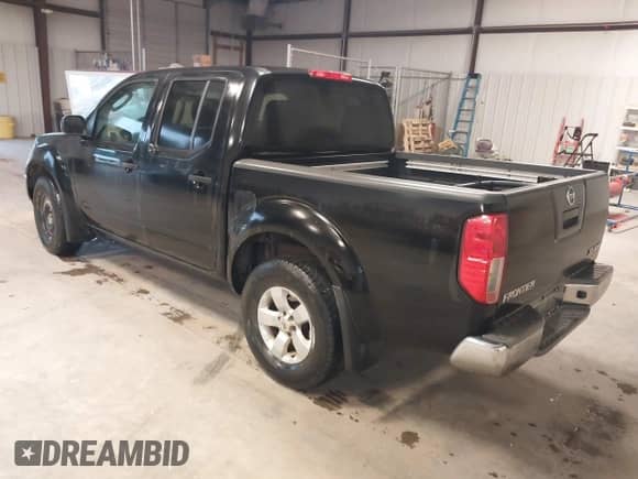 2009 Nissan Frontier SE with VIN 1N6AD07W69C402438, listed as a IAAI auction lot 40053442 with 258,057 mi miles and . Bid and sale history available at DreamBid. Image 3.