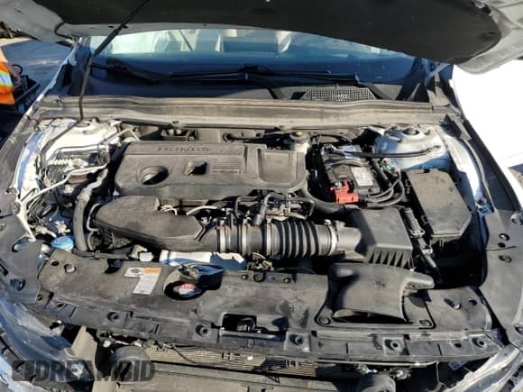 2021 Honda Accord Touring с VIN 1HGCV2F99MA020538, выставлен на аукционе Copart как лот 69041785 с пробегом 201 835 миль миль и Списание • Salvage title. История ставок и продаж доступна на DreamBid. Изображение 11.