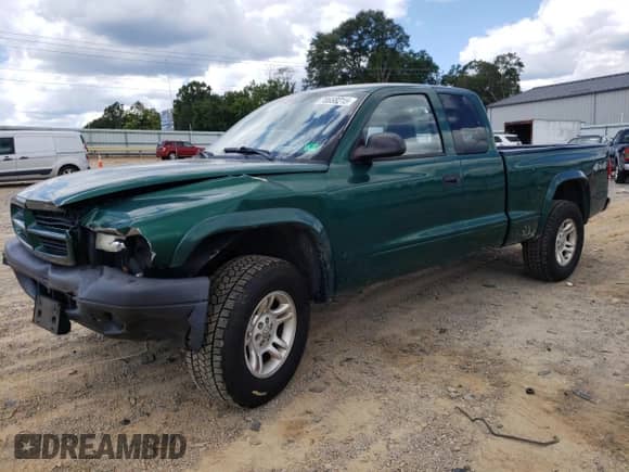 2003 Dodge Dakota с VIN 1D7HG12X33S231147, выставлен на аукционе Copart как лот 70668215 с пробегом 144 455 миль миль и Списание • Salvage title. История ставок и продаж доступна на DreamBid. Изображение 1.