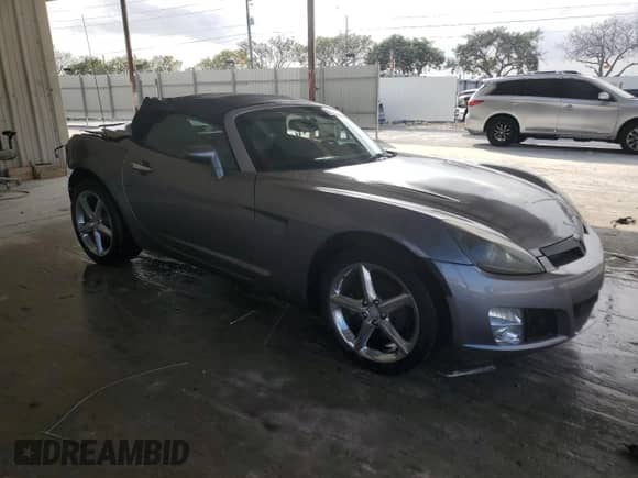 2009 Saturn Sky Red Line with VIN 1G8MG35XX9Y100409, listed as a Copart auction lot 44640615 with Not provided miles and Salvage title. Bid and sale history available at DreamBid. Image 4.