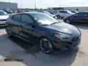 2019 Hyundai Veloster Turbo R-Spec z VIN KMHTH6AB1KU006986, wystawiony jako IAAI lot #42052689 z przebiegiem 92 317 mil mil oraz . Historia ofert i sprzedaży dostępna na DreamBid. Obrazek 1.