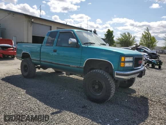 1994 GMC Sierra 1500 с VIN 1GTEK19K7RE564545, выставлен на аукционе Copart как лот 59007525 с пробегом 210 044 миль миль и Списание • Salvage title. История ставок и продаж доступна на DreamBid. Изображение 4.
