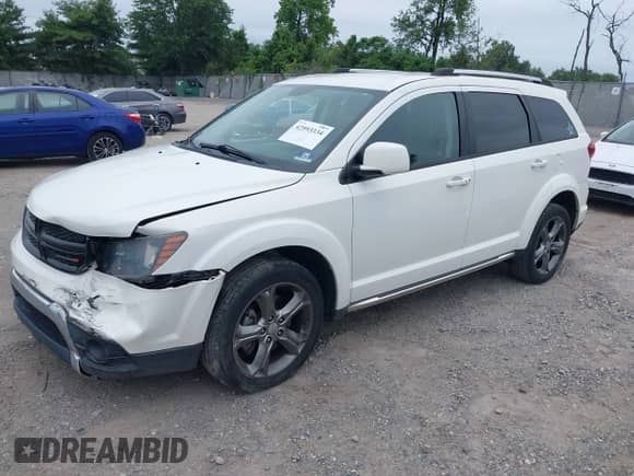 2015 Dodge Journey Crossroad with VIN 3C4PDCGB3FT713482, listed as a IAAI auction lot 42593334 with 136,020 mi miles and . Bid and sale history available at DreamBid. Image 2.