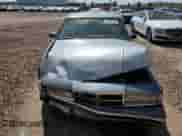 1991 Dodge Dynasty LE with VIN 1B3XC56R9MD115785, listed as a Copart auction lot 48073715 with 64,483 mi miles and Salvage title. Bid and sale history available at DreamBid. Image 5.