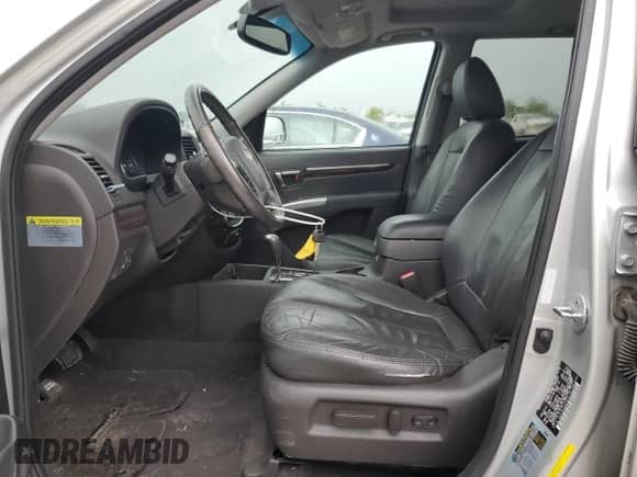 2012 Hyundai Santa Fe Limited с VIN 5XYZK4AG5CG156148, выставлен на аукционе Copart как лот 71792795 с пробегом 184 950 миль миль и Списание • Salvage title. История ставок и продаж доступна на DreamBid. Изображение 7.