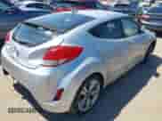 2012 Hyundai Veloster w/Gray Int z VIN KMHTC6AD6CU079711, wystawiony jako IAAI lot #41750279 z przebiegiem 154 746 mil mil oraz . Historia ofert i sprzedaży dostępna na DreamBid. Obrazek 4.