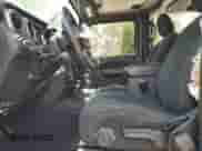 2021 Jeep Wrangler Unlimited Sport S with VIN 1C4HJXDG4MW507115, listed as a Copart auction lot 60253765 with 76,091 mi miles and Salvage title. Bid and sale history available at DreamBid. Image 7.