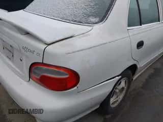 1999 Hyundai Accent GL with VIN KMHVF24N1XU583604, listed as a IAAI auction lot 41613240 with 163,938 mi miles and . Bid and sale history available at DreamBid. Image 6.