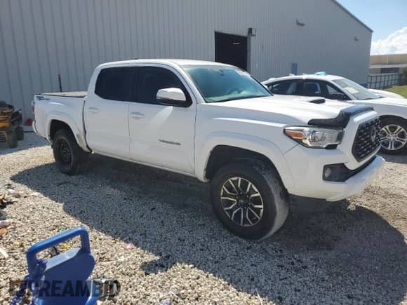 2020 Toyota Tacoma SR5 с VIN 3TMAZ5CNXLM128164, выставлен на аукционе Copart как лот 71077555 с пробегом 79 553 миль миль и Чистый • Clean title. История ставок и продаж доступна на DreamBid. Изображение 4.