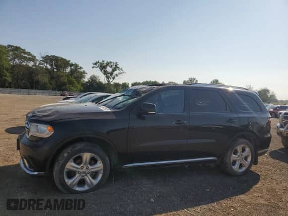 2015 Dodge Durango Limited with VIN 1C4RDJDG7FC870215, listed as a Copart auction lot 68575895 with 185,274 mi miles and Salvage title. Bid and sale history available at DreamBid. Image 1.
