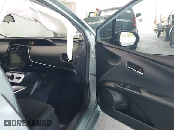 2016 Toyota Prius Four z VIN JTDKARFU4G3004839, wystawiony jako IAAI lot #42707938 z przebiegiem 76 104 mil mil oraz . Historia ofert i sprzedaży dostępna na DreamBid. Obrazek 5.