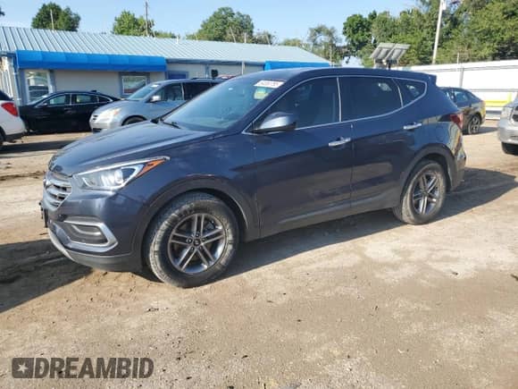 2018 Hyundai Santa Fe 2.4L с VIN 5NMZTDLB9JH095100, выставлен на аукционе Copart как лот 64850795 с пробегом 92 794 миль миль и Списание • Salvage title. История ставок и продаж доступна на DreamBid. Изображение 1.