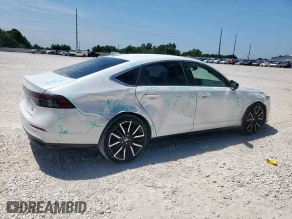 2023 Honda Accord Touring with VIN 1HGCY2F82PA041850, listed as a Copart auction lot 67174775 with 31,779 mi miles and Salvage title. Bid and sale history available at DreamBid. Image 3.