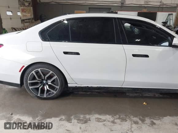 2023 BMW 7 Series 760i xDrive with VIN WBA33EJ01PCM24809, listed as a IAAI auction lot 43310239 with 31,704 mi miles and . Bid and sale history available at DreamBid. Image 19.