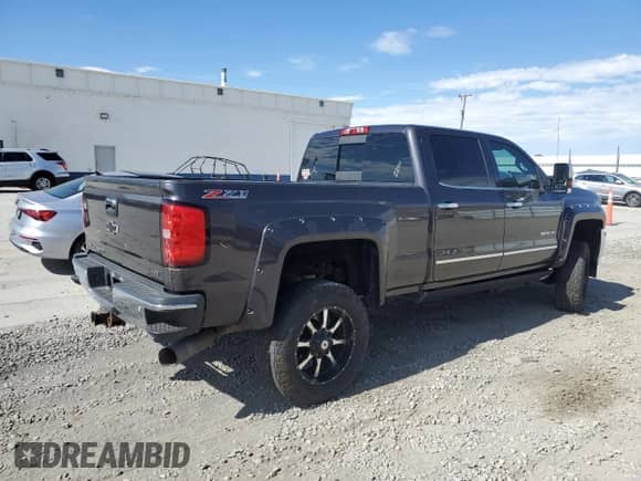 2015 Chevrolet Silverado 3500HD LTZ с VIN 1GC4K0C89FF618128, выставлен на аукционе Copart как лот 81877625 с пробегом 144 144 миль миль и Списание • Salvage title. История ставок и продаж доступна на DreamBid. Изображение 3.