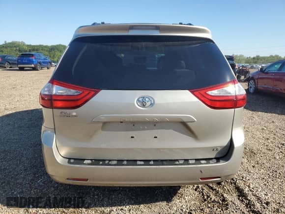 2015 Toyota Sienna LE с VIN 5TDKK3DCXFS551597, выставлен на аукционе Copart как лот 71127105 с пробегом 160 738 миль миль и Списание • Salvage title. История ставок и продаж доступна на DreamBid. Изображение 6.