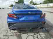 2023 Subaru WRX with VIN JF1VBAA60P9807316, listed as a Copart auction lot 59049745 with 14,877 mi miles and Salvage title. Bid and sale history available at DreamBid. Image 6.