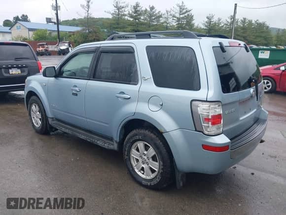 2008 Mercury Mariner with VIN 4M2CU91178KJ12057, listed as a IAAI auction lot 42358190 with 100,000 mi miles and . Bid and sale history available at DreamBid. Image 3.