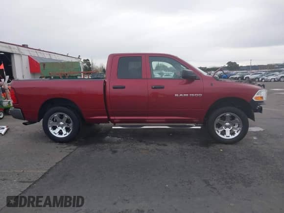 2011 Ram 1500 SLT with VIN 1D7RV1GP2BS553232, listed as a IAAI auction lot 41777555 with 136,426 mi miles and . Bid and sale history available at DreamBid. Image 14.