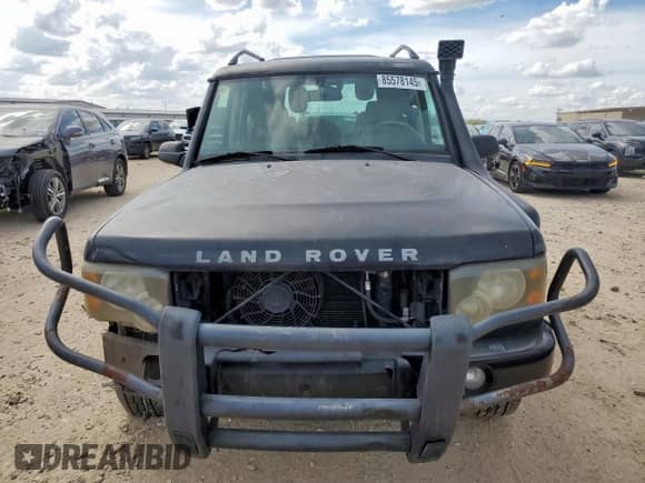 2003 Land Rover Discovery SE с VIN SALTW16423A798407, выставлен на аукционе Copart как лот 85578145 с пробегом 199 508 миль миль и Списание • Salvage title. История ставок и продаж доступна на DreamBid. Изображение 5.