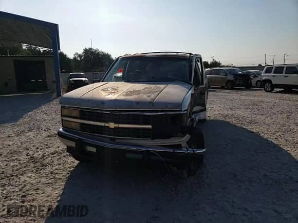 1992 Chevrolet Suburban с VIN 1GNFK16K9NJ352134, выставлен на аукционе Copart как лот 69495284 с пробегом 235 849 миль миль и Списание • Salvage title. История ставок и продаж доступна на DreamBid. Изображение 10.