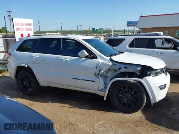 2020 Jeep Grand Cherokee Altitude with VIN 1C4RJFAG3LC138086, listed as a IAAI auction lot 42868729 with 77,706 mi miles and . Bid and sale history available at DreamBid. Image 13.