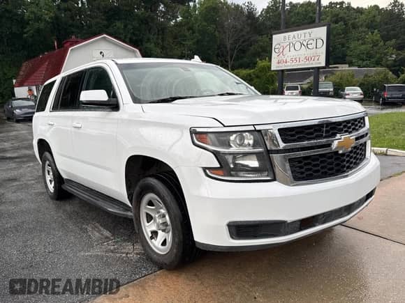 2019 Chevrolet Tahoe Commercial z VIN 1GNLCDECXKR281986, wystawiony jako Copart lot #63148895 z przebiegiem 103 693 mil mil oraz Czysty tytuł • Clean title. Historia ofert i sprzedaży dostępna na DreamBid. Obrazek 1.