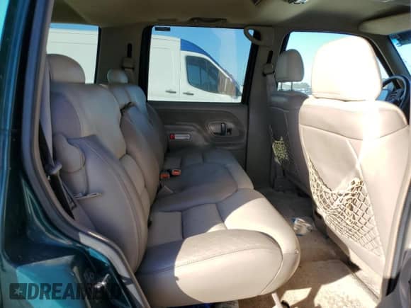 2000 Chevrolet Tahoe Z71 с VIN 1GNEK13R8YR162635, выставлен на аукционе Copart как лот 77243114 с пробегом 106 369 миль миль и Списание • Salvage title. История ставок и продаж доступна на DreamBid. Изображение 11.