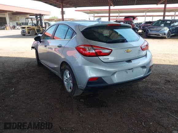 2018 Chevrolet Cruze LT с VIN 3G1BE6SM6JS653786, выставлен на аукционе IAAI как лот 42726411 с пробегом 84 264 миль миль и . История ставок и продаж доступна на DreamBid. Изображение 3.