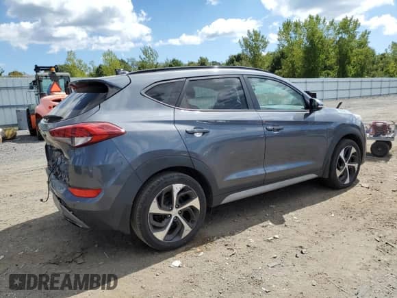 2018 Hyundai Tucson Limited with VIN KM8J3CA27JU677582, listed as a Copart auction lot 69106765 with 99,346 mi miles and Salvage title. Bid and sale history available at DreamBid. Image 3.