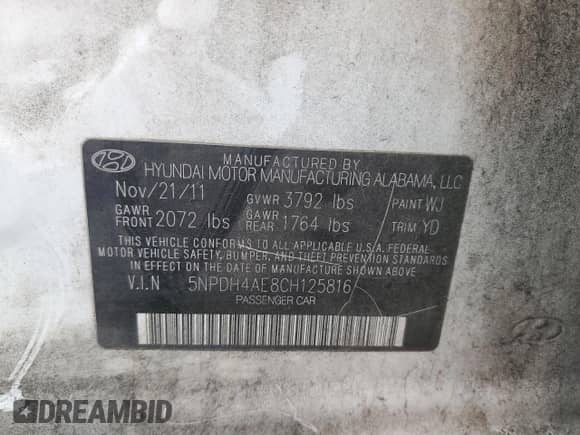 2012 Hyundai Elantra Limited with VIN 5NPDH4AE8CH125816, listed as a Copart auction lot 58403405 with 143,254 mi miles and Salvage title. Bid and sale history available at DreamBid. Image 12.