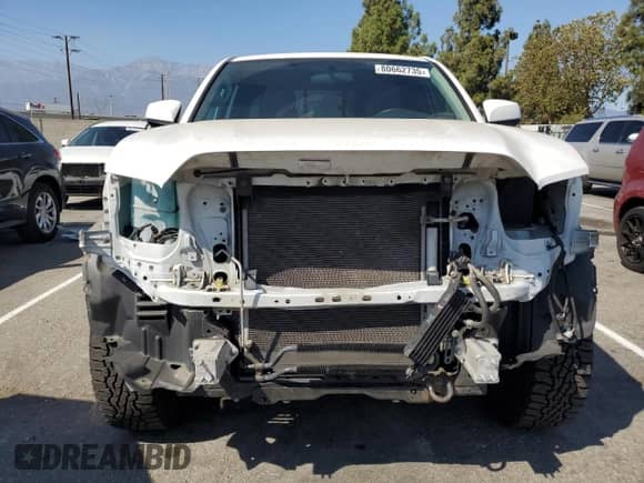 2016 Toyota Tacoma TRD Sport с VIN 5TFRZ5CN1GX015478, выставлен на аукционе Copart как лот 80662735 с пробегом 36 173 миль миль и Списание • Salvage title. История ставок и продаж доступна на DreamBid. Изображение 5.